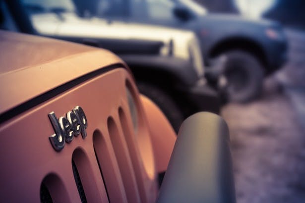 front of jeep with logo