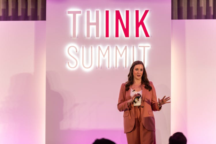 Rachel Cowlishaw on stage at Think Summit Europe, 2023