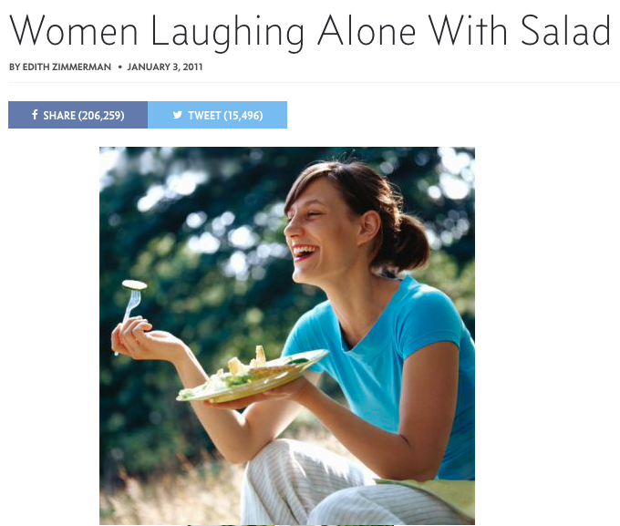 women laughing alone with salad stock photography